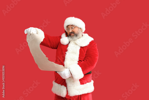 Santa Claus reading letter ...