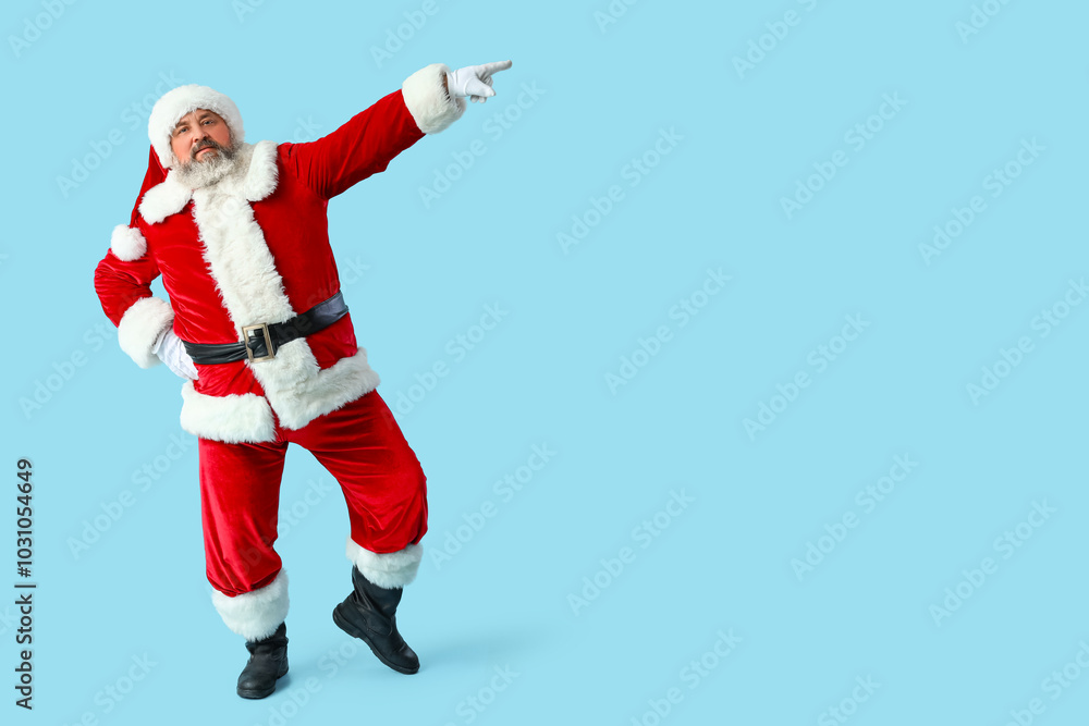Dancing Santa Claus on blue background Dancing Santa Claus on blue background