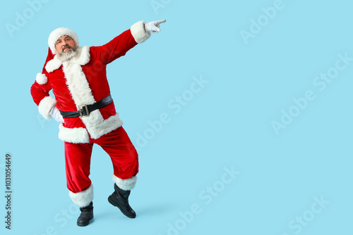 Dancing Santa Claus on blue...