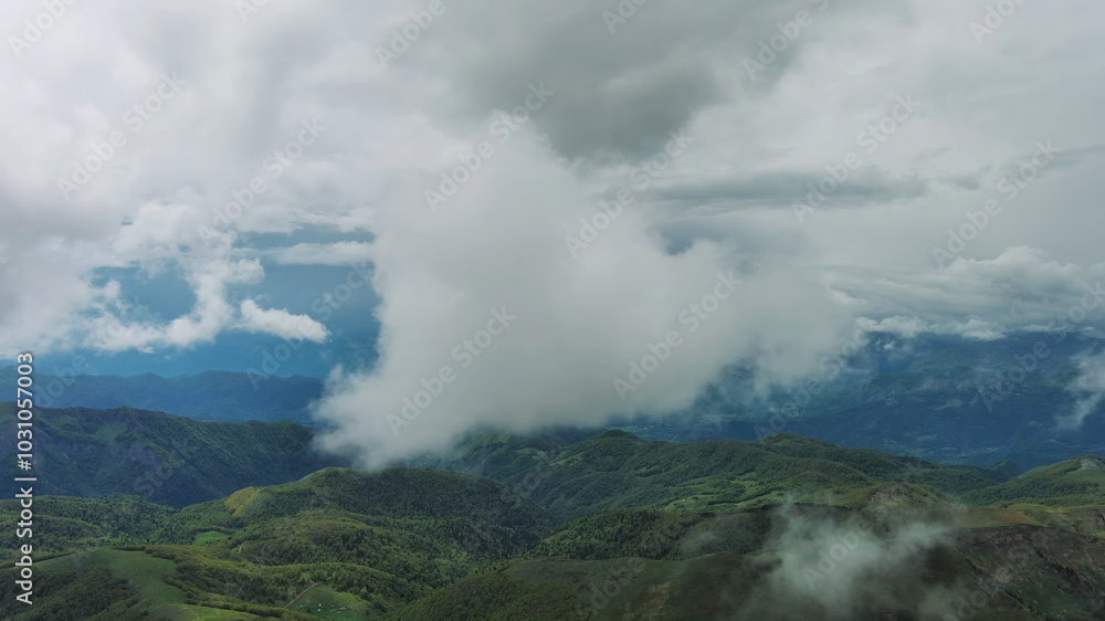 Clouds over summer green mountains Clouds over summer green mountains