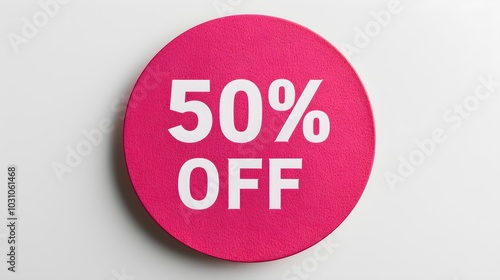 White '50% OFF' Text on a Hot Pink Round Paper Note. White Background with Copy Space