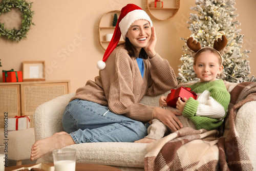 Happy mother and her little...