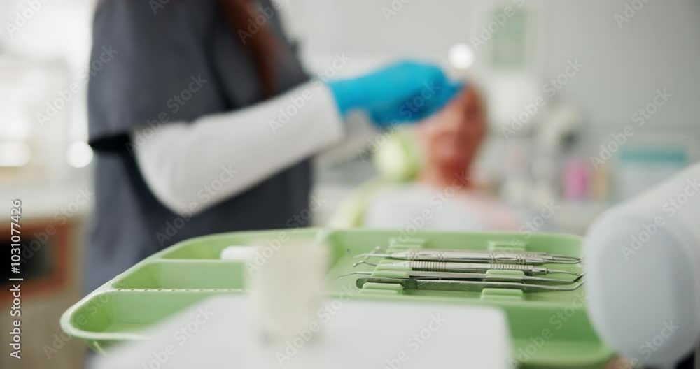 Tools, closeup and hands with people at dentist for wellness, oral hygiene and medical checkup. Consulting, dental and healthcare advice with patient at clinic for orthodontist, treatment and exam Tools, closeup and hands with people at dentist for wellness, oral hygiene and medical checkup. Consulting, dental and healthcare advice with patient at clinic for orthodontist, treatment and exam