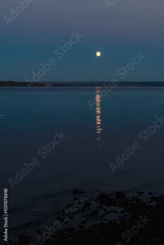 The moon above Lake Mjøsa in October. photo