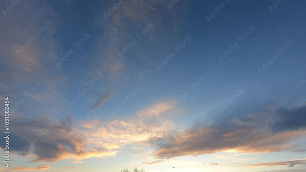 time-lapse sunset sky, cloudscape background. colorful clouds generate powerful energy and environment. wide-angle sky in the sunrise reflect on cloudscape. peaceful nature background time-lapse sunset sky, cloudscape background. colorful clouds generate powerful energy and environment. wide-angle sky in the sunrise reflect on cloudscape. peaceful nature background