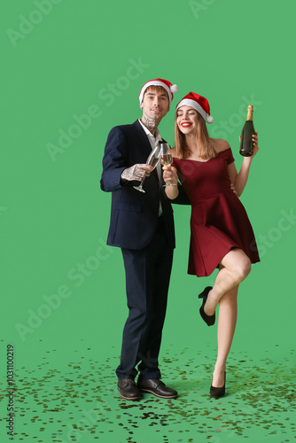 Festive couple celebrating ...