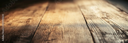 Bird's-eye view of richly textured, warmly colored wooden floorboards perfectly lit to show details and warmth. photo