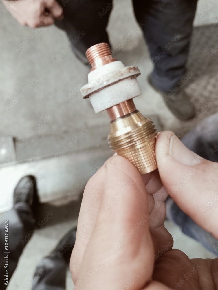 TIG torch spare parts inside a carpentry shop