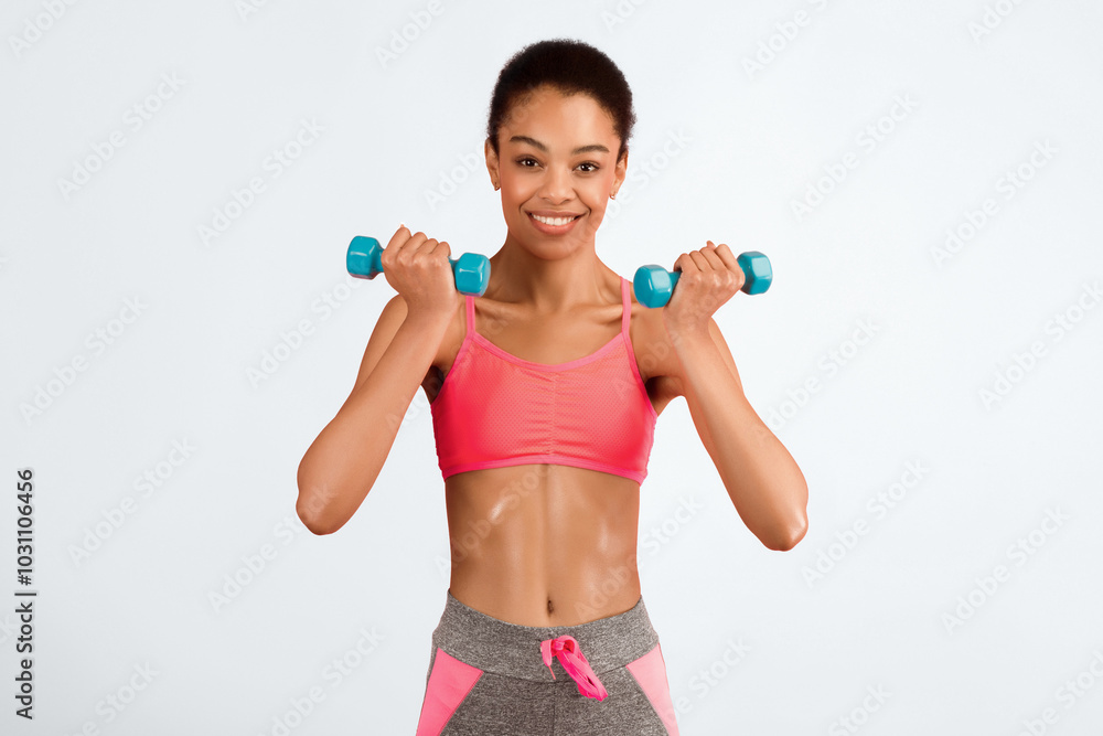 Workout. Smiling Afro Girl Doing Dumbbell Biceps Curl Exercise Over Pink Background. Studio Shot Workout. Smiling Afro Girl Doing Dumbbell Biceps Curl Exercise Over Pink Background. Studio Shot