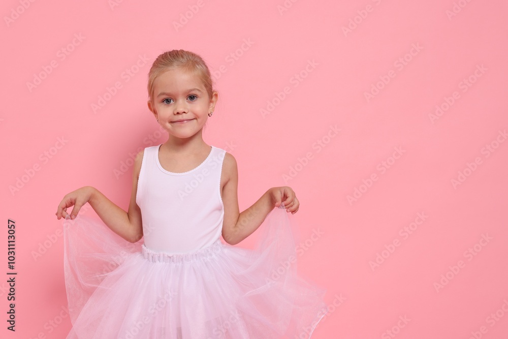 Little girl pretending to be ballerina on pink background, space for text. Dreaming of future profession Little girl pretending to be ballerina on pink background, space for text. Dreaming of future profession