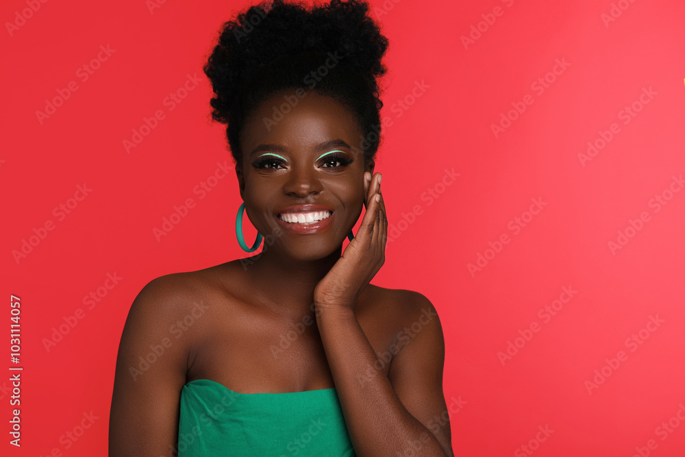 Beautiful woman smiling on red background. Space for text Beautiful woman smiling on red background. Space for text