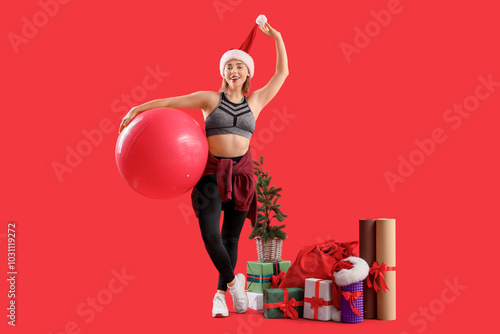 Sporty young woman with fit...