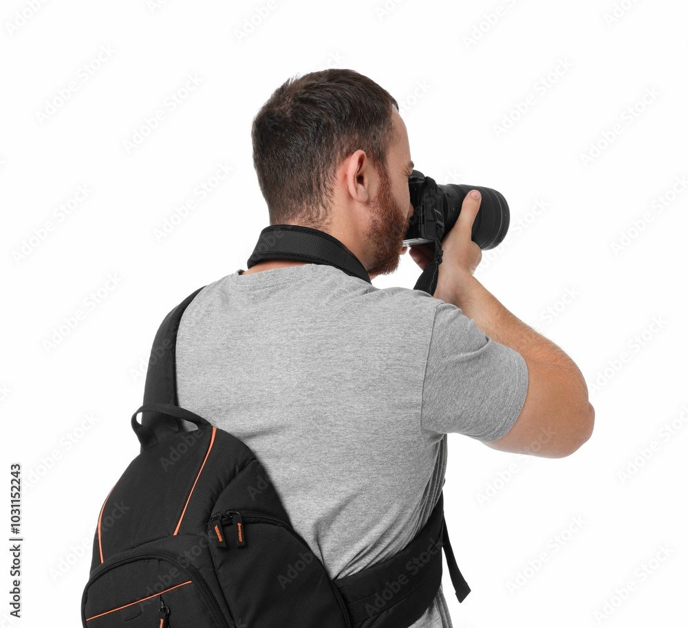 Photographer with backpack and camera taking picture on white background, back view Photographer with backpack and camera taking picture on white background, back view