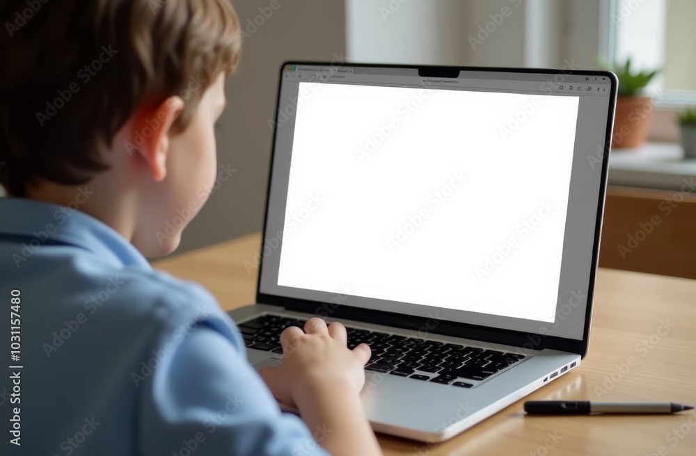 A young child engaged in online learning from home, focused on a laptop screen in a cozy room during the daytime A young child engaged in online learning from home, focused on a laptop screen in a cozy room during the daytime