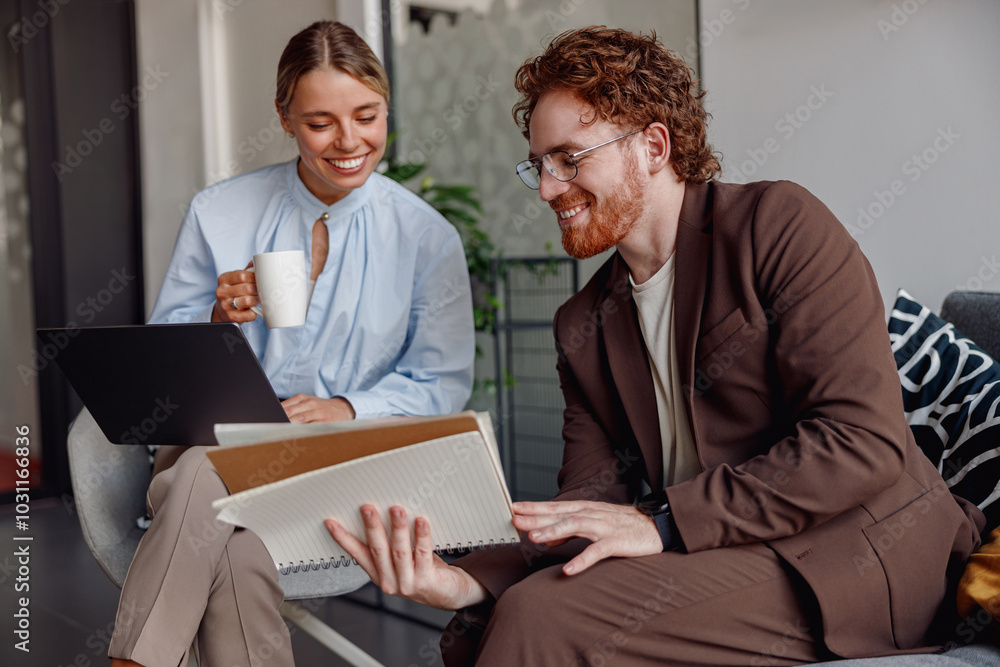 A highly productive business meeting taking place with a laptop and coffee, emphasizing teamwork and creativity A highly productive business meeting taking place with a laptop and coffee, emphasizing teamwork and creativity