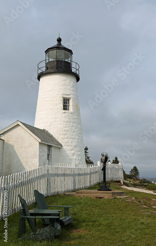 The Pemaquid Point lighthouse vertical - historic 19th century lighthouse in Maine photo