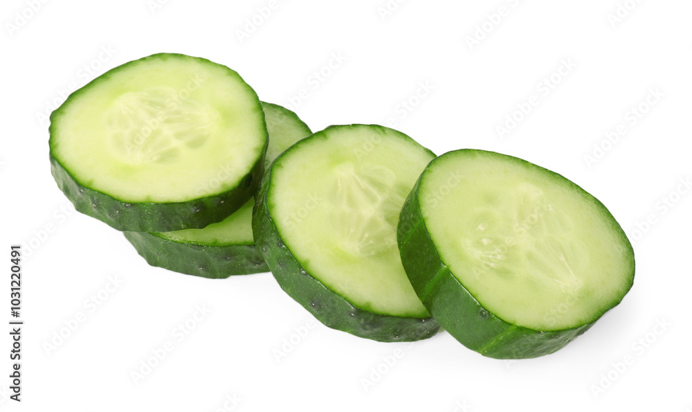 Slices of fresh cucumber isolated on white Slices of fresh cucumber isolated on white