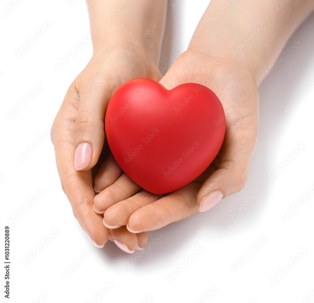 Woman with red decorative heart at white table, closeup. Space for text Woman with red decorative heart at white table, closeup. Space for text