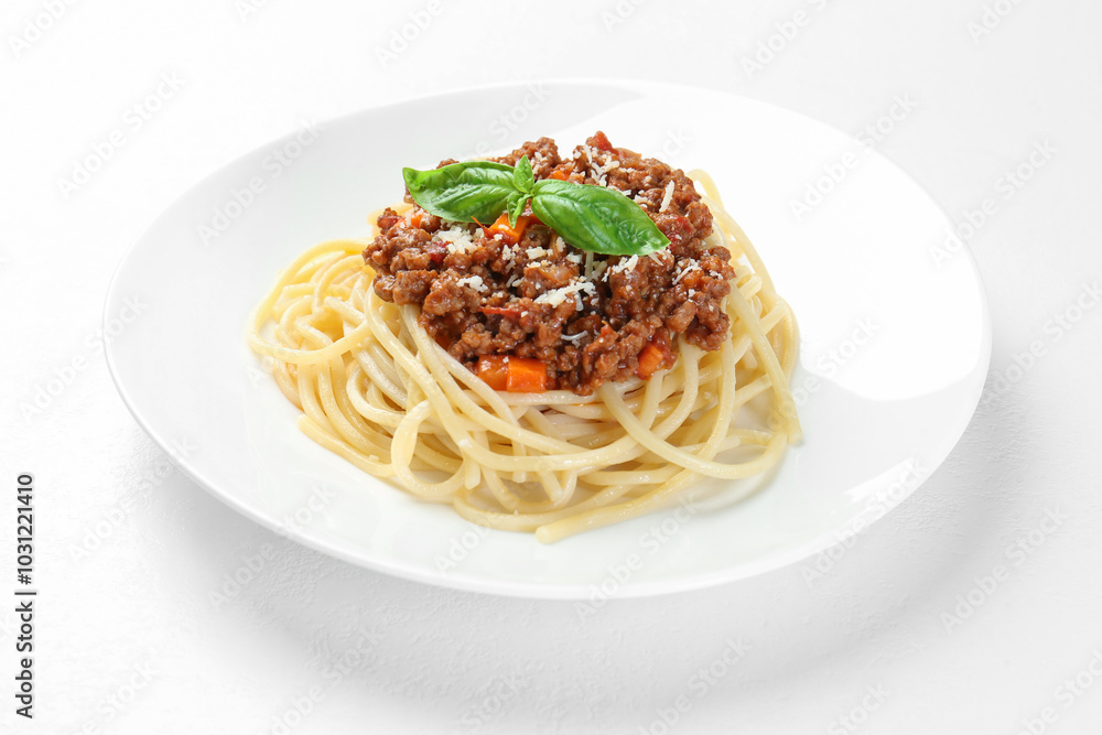 Plate with tasty pasta bolognese on white table, closeup Plate with tasty pasta bolognese on white table, closeup