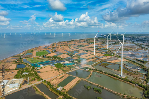 Aerial view of the prawn farm cleaning in Ninh Phuoc, Ninh Thuan, Vietnam. The growing aquaculture business continuously threatening the nearby wetlands. photo