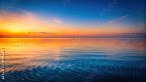 Serene ocean horizon at twilight with warm color gradient reflected on water surface , ocean, horizon, twilight, warm colors