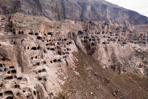 Impressive view of caves of Vardzia monastery complex carved in crag, one of main landmark of southern Georgia