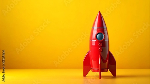 Red Rocket Toy on Yellow Background with Copy Space