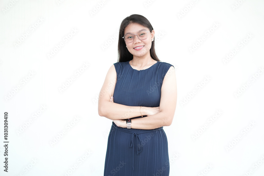 Beautiful Asian woman smiling confidently with arms crossed, isolated against a white background Beautiful Asian woman smiling confidently with arms crossed, isolated against a white background