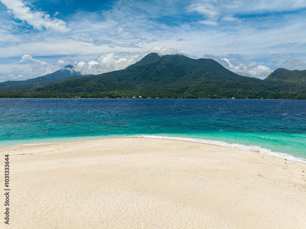 Transparent ocean waves on white sandy coast. White Island. Camiguin, Philippines. Transparent ocean waves on white sandy coast. White Island. Camiguin, Philippines.