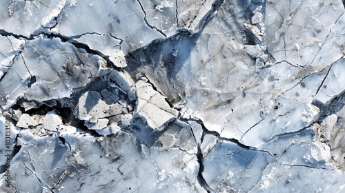 Aerial view capturing the stunning ice fields of Chilean Patagonia revealing intricate cracks and crevices in the frozen landscape