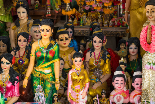 Lop Buri, Thailand - September, 20, 2024 :A Colorful Display of Thai Spirit House Figures at Lop Buri, Thailand. photo