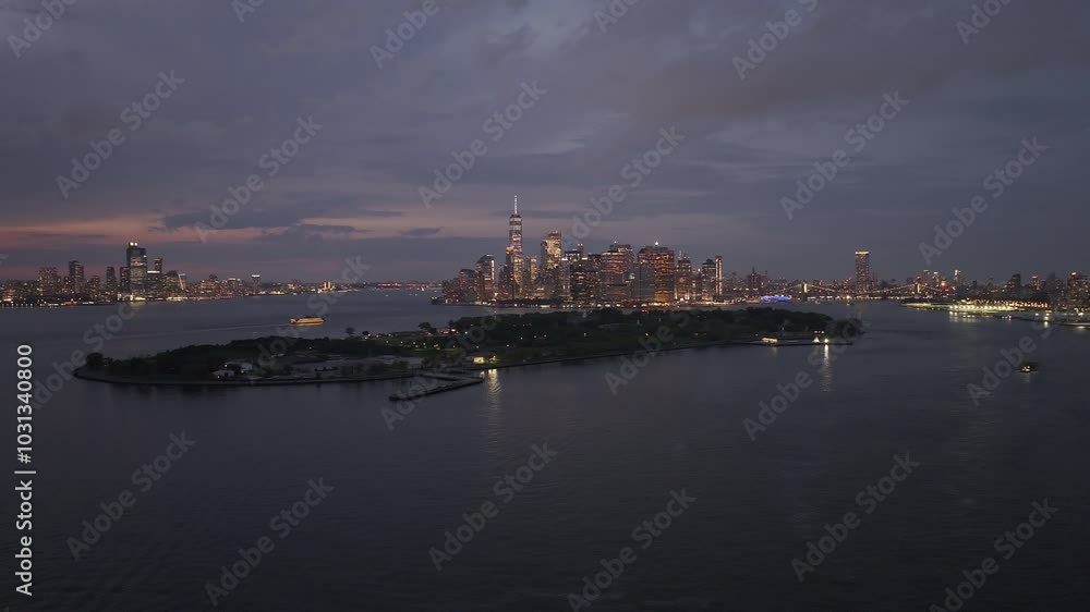 Aerial view of Lower Manhattan and Governor's Island at dusk Aerial view of Lower Manhattan and Governor's Island at dusk