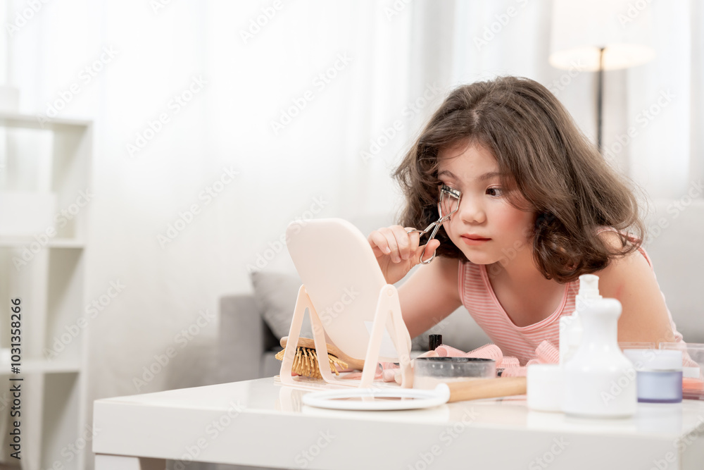 curling eyelashes. Happy children sit in front of a mirror makeup on face Advertisement, lifestyle , cosmetics, makeup accessories, beauty activity, beautician, talent, love beauty curling eyelashes. Happy children sit in front of a mirror makeup on face Advertisement, lifestyle , cosmetics, makeup accessories, beauty activity, beautician, talent, love beauty