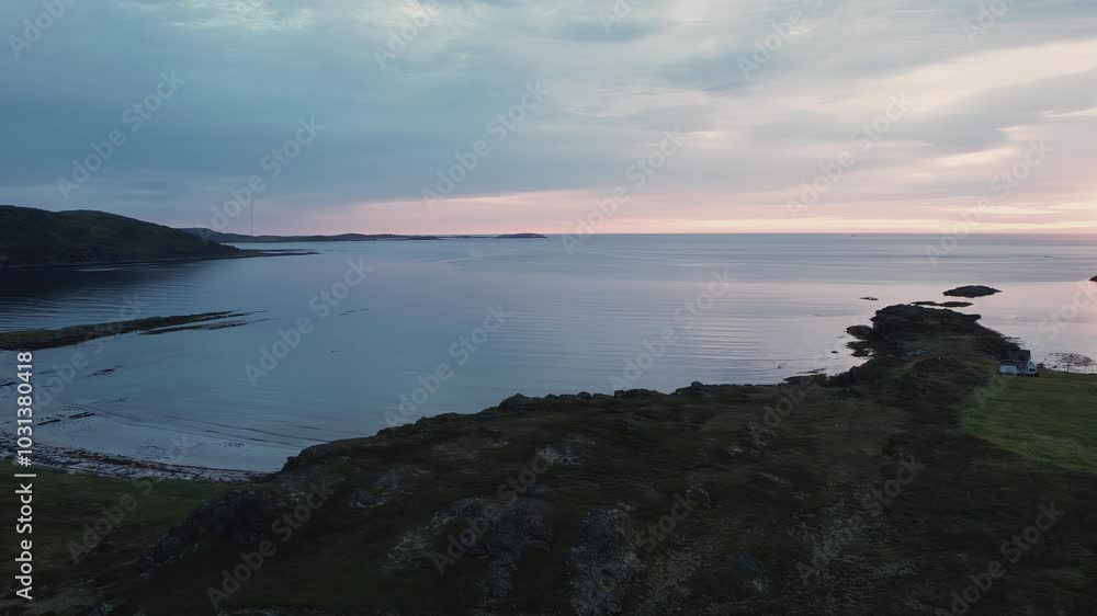Sunset over the bay with a beach, without people. Aerial, backward camera move. Sunset over the bay with a beach, without people. Aerial, backward camera move.