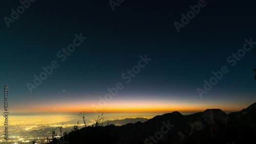 Wallpaper Mural C/2023 A3 (Tsuchinshan-ATLAS) Timelapse of Comet setting over city lights in Los Angeles, California, USA in October 2024 Torontodigital.ca