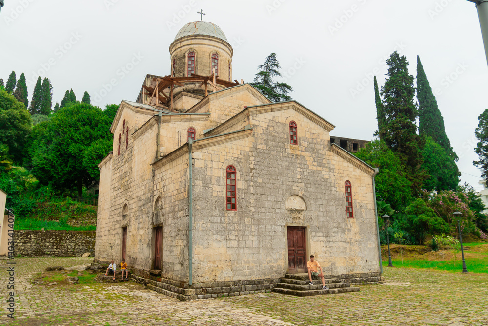 Naklejka premium The ancient stone wall is an architectural monument in close-up