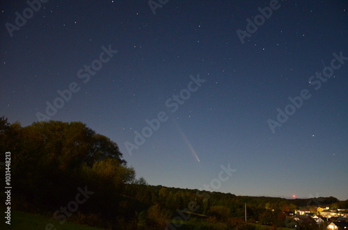 Night landscape after sunset in the Czech highlands (Slezko, Opava, Hnevosice) with comet C2023 A3 Tsuchinshan-ATLAS, Czech Republic