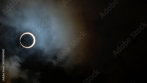 Solar Eclipse in the clouds over Easter Island in a Ring of fire with baileys beads visible in the annular solar eclipse