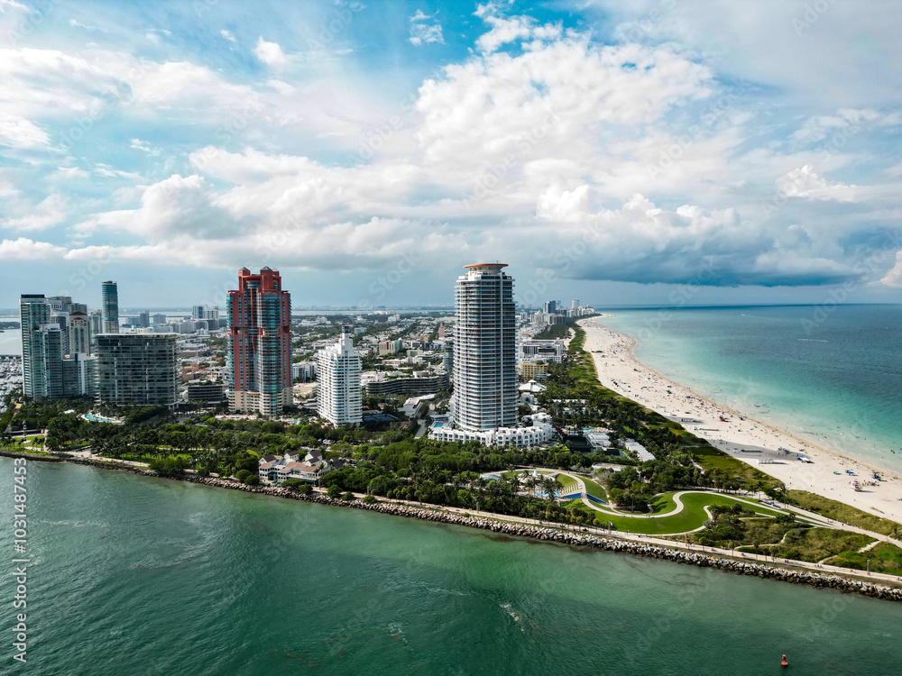 Miami beach, ocean drive summer cityscape. Miami Beach, South Beach, Florida, USA. Coastline, aerial view. Aerial view of high skyscrapers and ocean, Miami Beach, Florida, USA. Miami beach, ocean drive summer cityscape. Miami Beach, South Beach, Florida, USA. Coastline, aerial view. Aerial view of high skyscrapers and ocean, Miami Beach, Florida, USA.