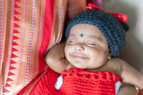 Photography ndian family spending time together, wearing traditional and casual outfits with a baby, a young girl, and grandparents in a high-rise apartment in Kuala Lumpur, Malaysia