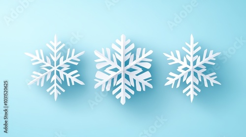 Three decorative snowflakes on a light blue background, white isolate background.