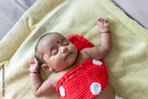 Photography ndian family spending time together, wearing traditional and casual outfits with a baby, a young girl, and grandparents in a high-rise apartment in Kuala Lumpur, Malaysia