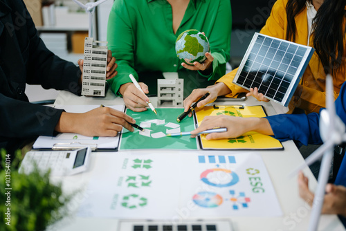 Wallpaper Mural Green business company and Solar Energy Environment city Concept. business team people planning . Torontodigital.ca