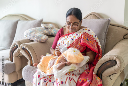 Photography ndian family spending time together, wearing traditional and casual outfits with a baby, a young girl, and grandparents in a high-rise apartment in Kuala Lumpur, Malaysia