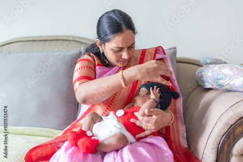 Photography ndian family spending time together, wearing traditional and casual outfits with a baby, a young girl, and grandparents in a high-rise apartment in Kuala Lumpur, Malaysia