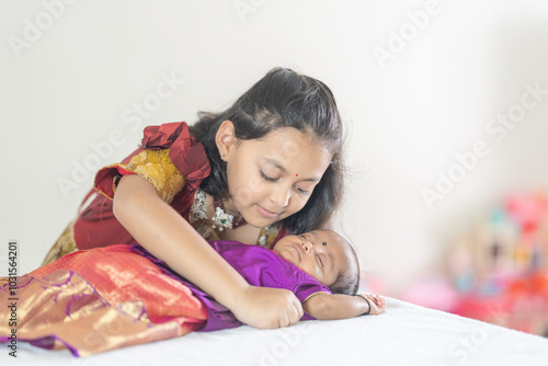 Photography ndian family spending time together, wearing traditional and casual outfits with a baby, a young girl, and grandparents in a high-rise apartment in Kuala Lumpur, Malaysia