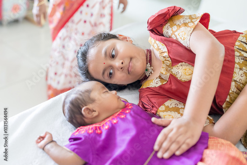 Wallpaper Mural ndian family spending time together, wearing traditional and casual outfits with a baby, a young girl, and grandparents in a high-rise apartment in Kuala Lumpur, Malaysia. Torontodigital.ca