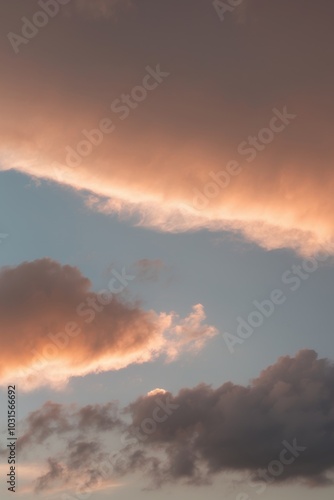 Serene Sunrise Over Fluffy Clouds in the Sky.