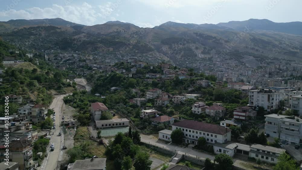 A view from the castle towards the center of the city of Gjirokaster, Albania in summertime. A view from the castle towards the center of the city of Gjirokaster, Albania in summertime.