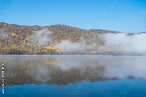 Early morning views of the lake and the mist on the surface of the water